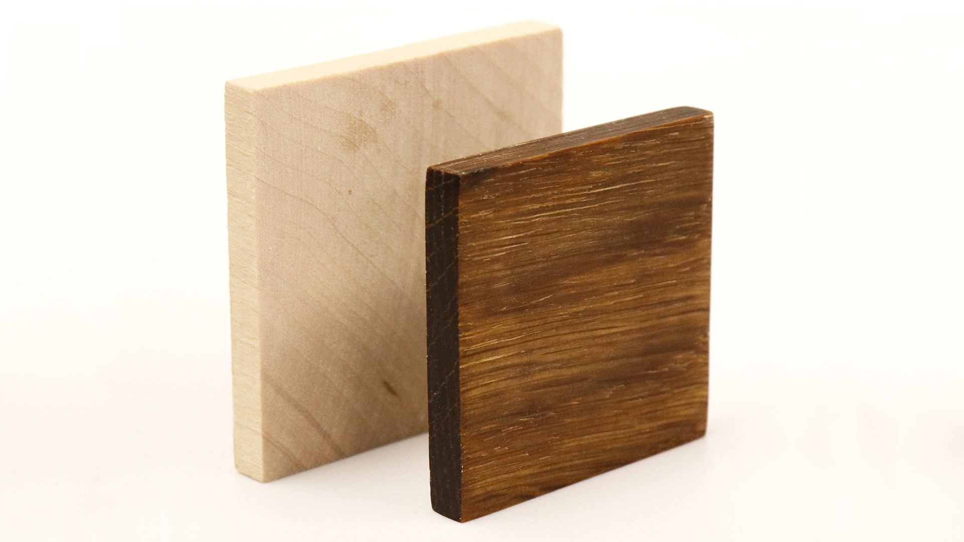 Many types of wood can be compressed to form MetalWood—a building material stronger and lighter than steel. The extreme compression process used causes wood to become much denser (below). Images courtesy of InventWood.